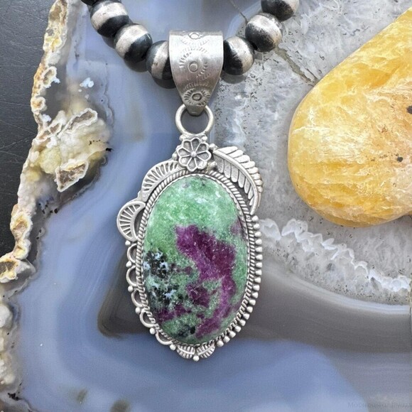 Sterling Silver Southwestern Style Elongated Oval Ruby Zoisite Decorated Pendant